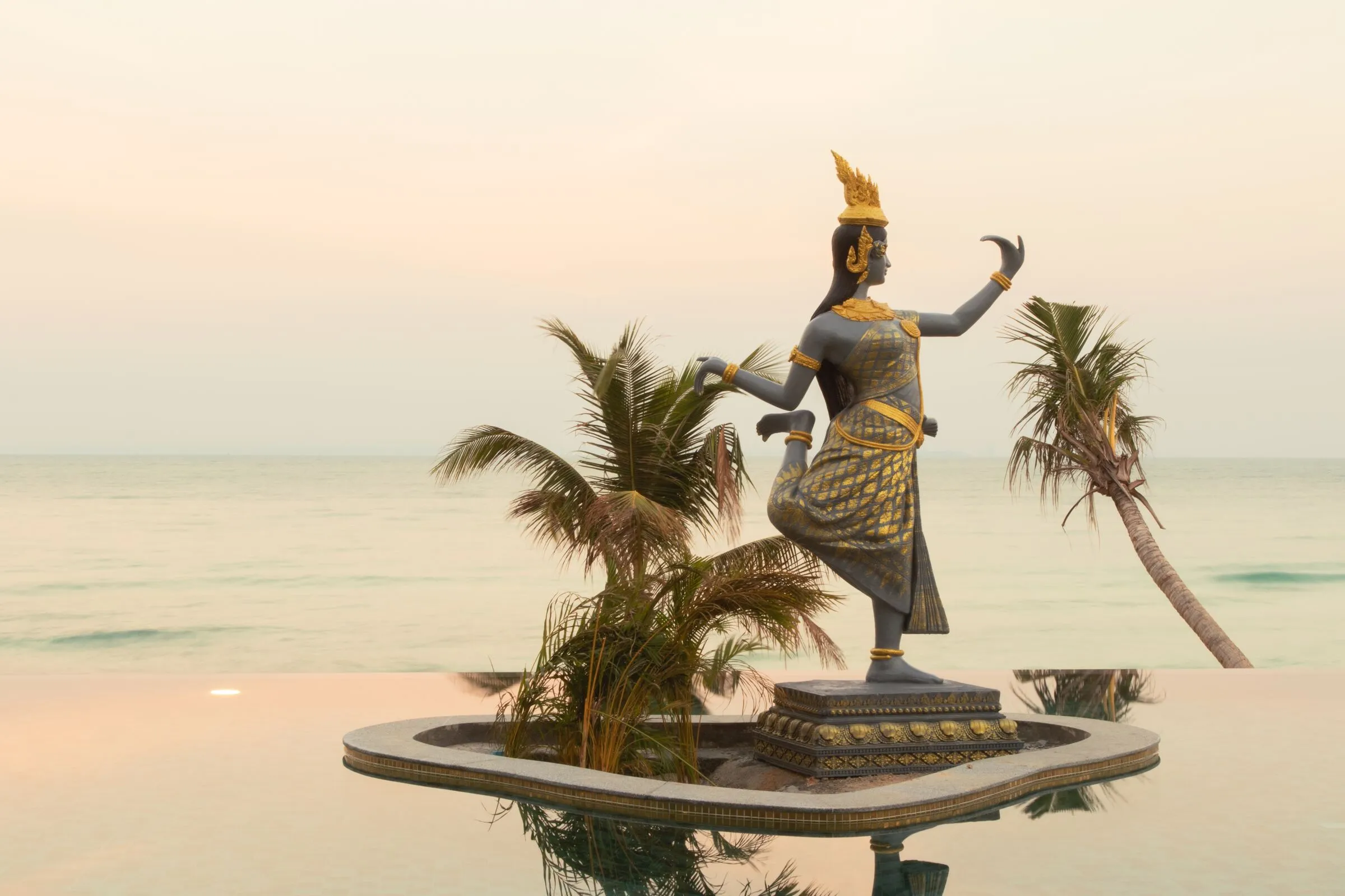 Apsara statue in the pool